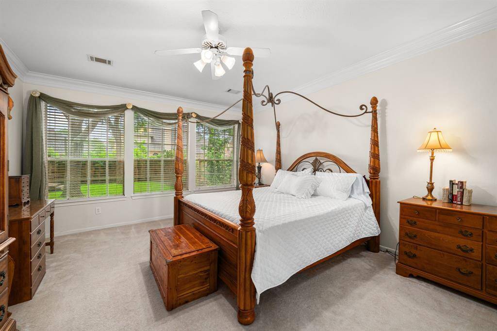 Relax comfortably in this beautiful Primary Bedroom with great windows and plenty of room for a sitting area.