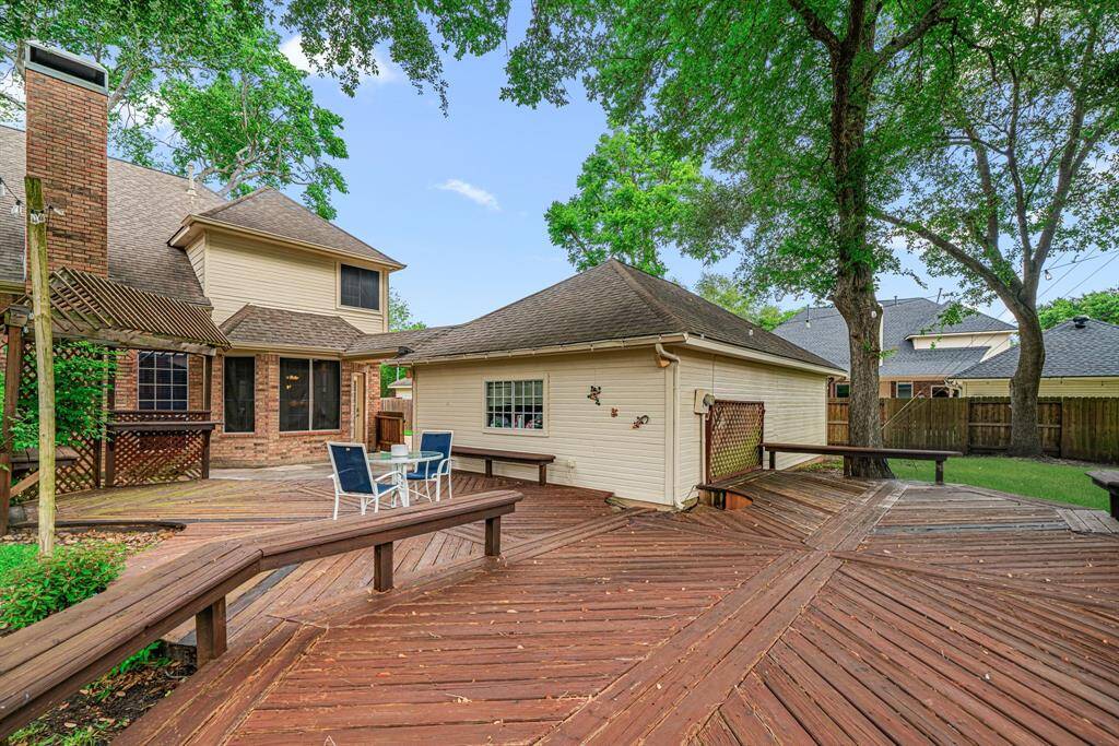 The sprawling deck offers plenty of room for outdoor cooking, entertaining, and relaxing.