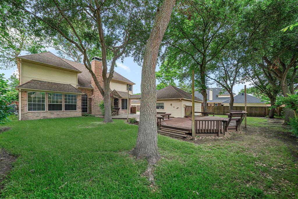 Another view of the expansive backyard.