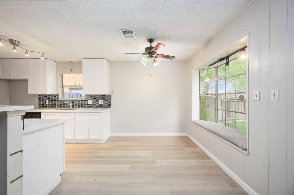 Enjoy the light and bright view to your backyard while you eat breakfast
