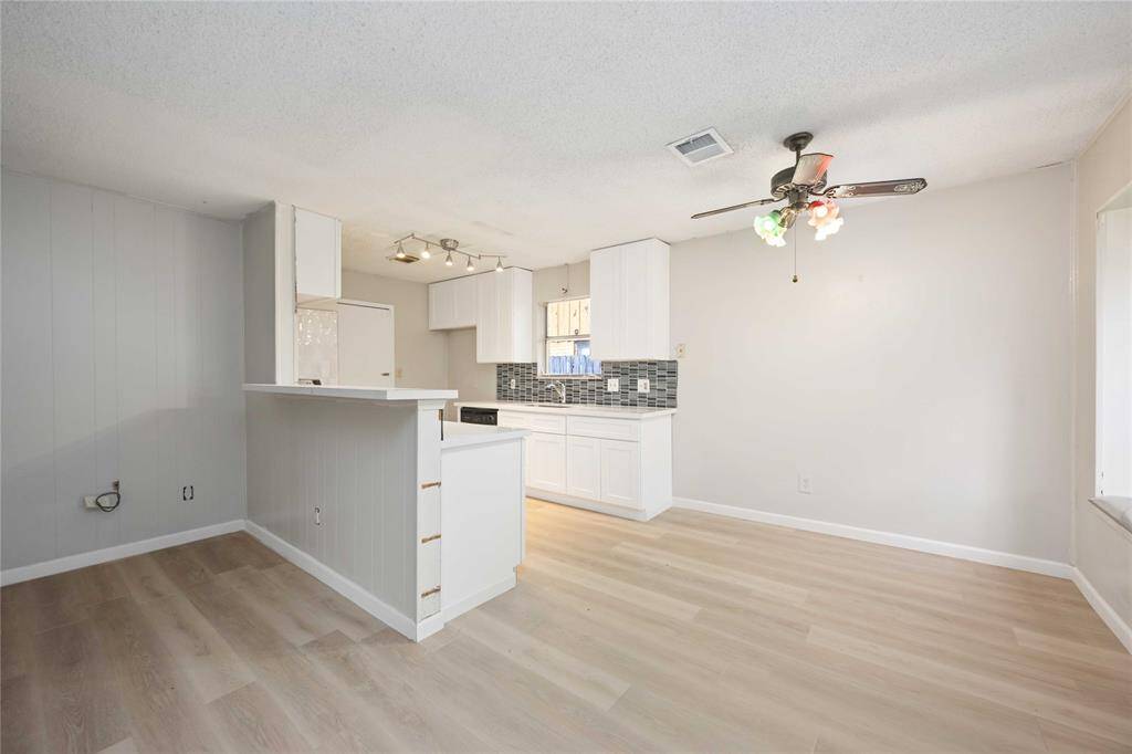 Fresh paint, new cabinets, new sink and flooring