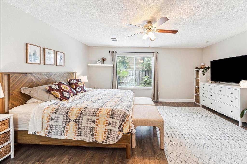 Expansive and naturally lit primary suite.