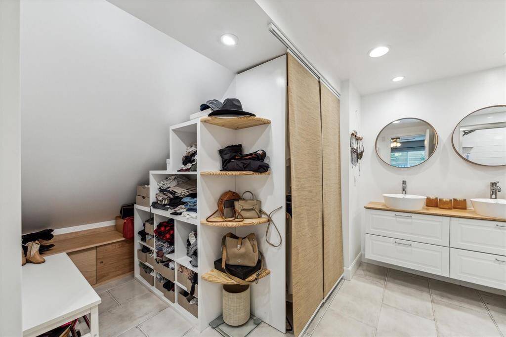 Sizable primary closet with built-in storage.