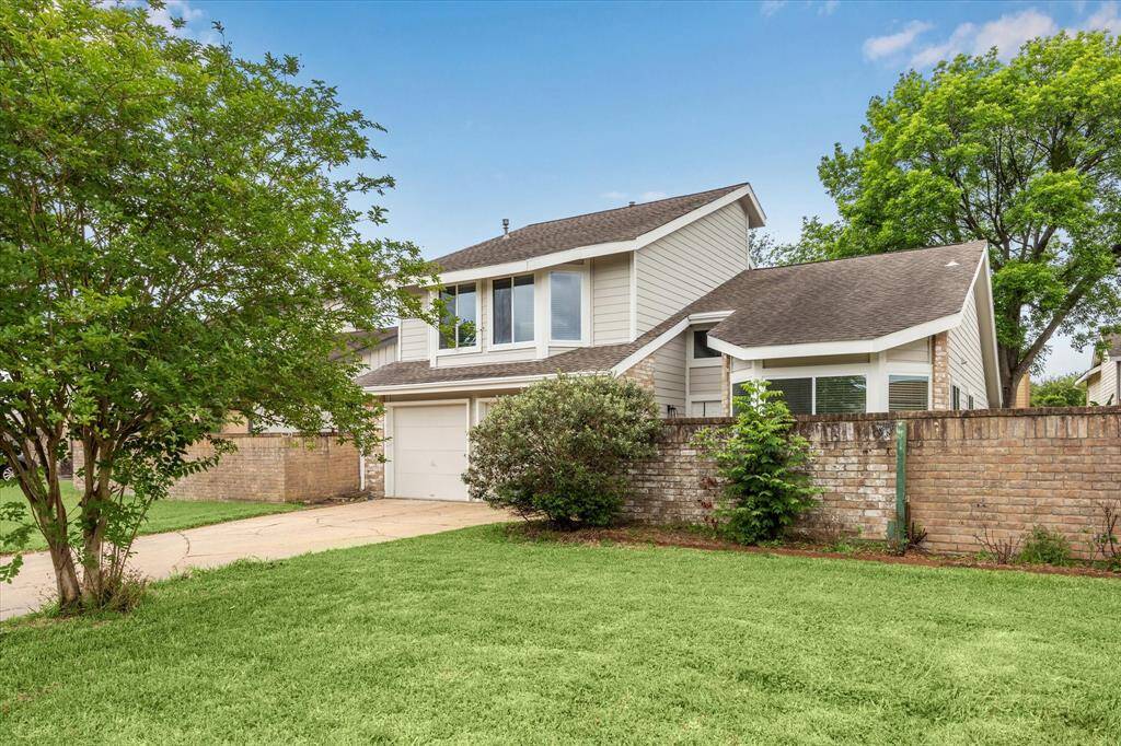 Located on a peaceful cul-de-sac with a large driveway and two-car garage.