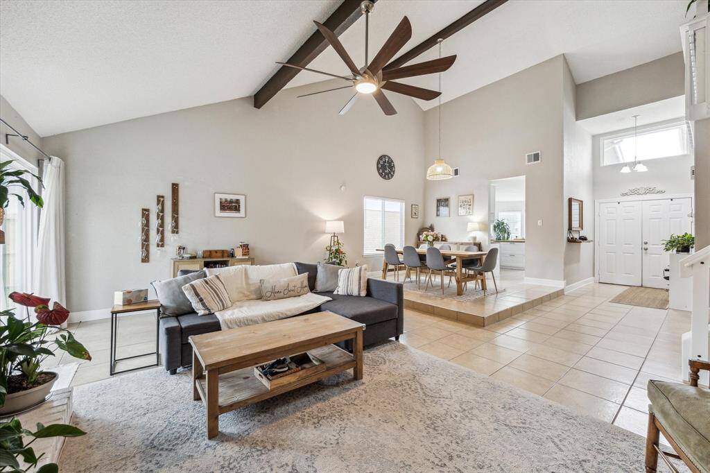 Enter through the formal foyer into the spacious and abundantly lit living /dining spaces.