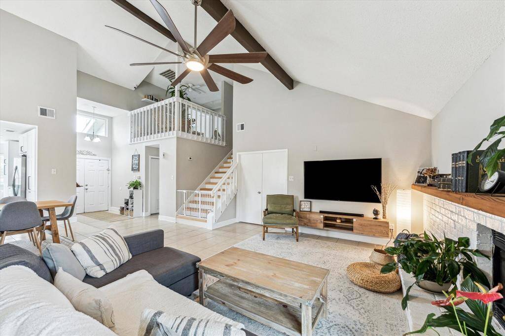 Impressive, bright and airy living areas with vaulted ceilings and antural wood beam.