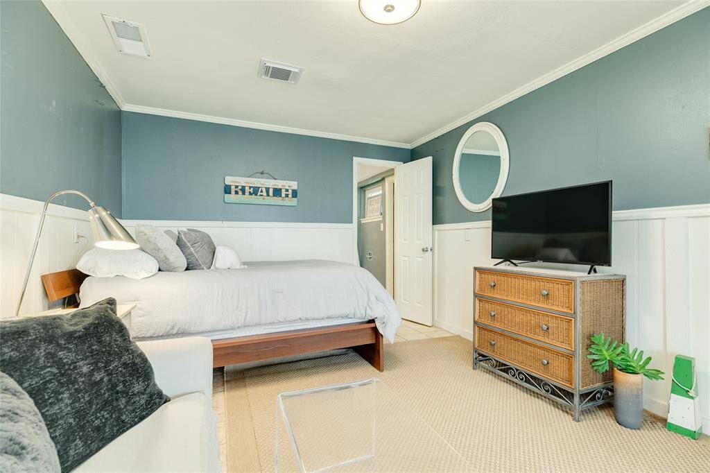 Inviting ground level bedroom with newly renovated bathroom and has central air and heat.