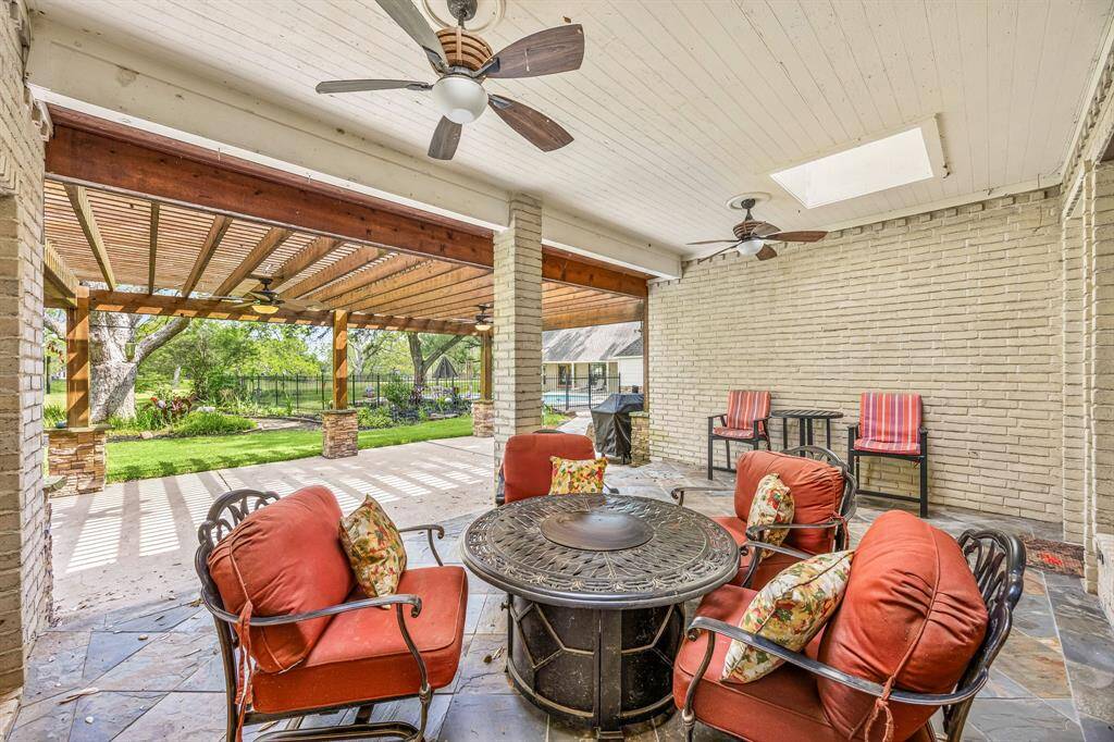 Come and see this spacious backyard with its beautiful covered patio and paved walkway down the side yard. There is plenty of room for the kids to play and adults to relax! Perfect for your outdoor living space, patio furniture, bbq pit, and so much more. The possibilities are endless!