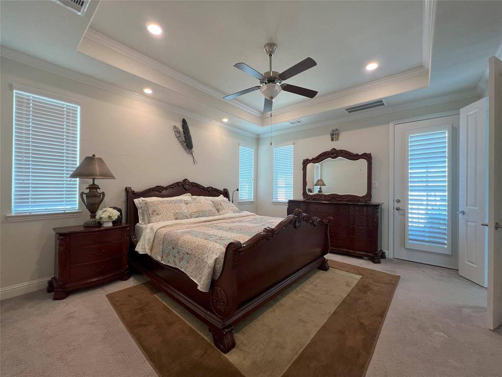 Primary suite with lots of natural lights and a private balcony