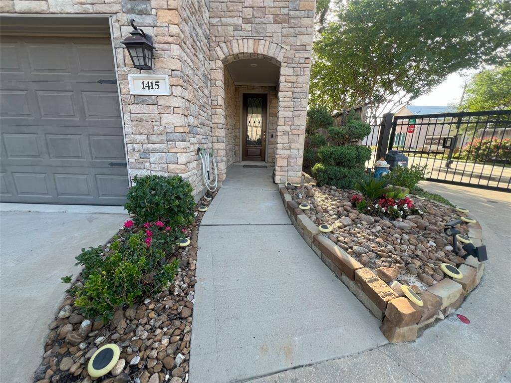 Beautiful landscape with upgraded stone and stucco