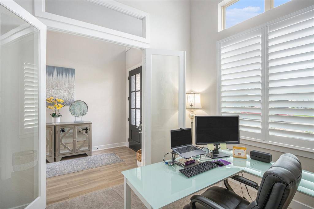 Plenty of natural light and french doors to close off the office/study area when working.