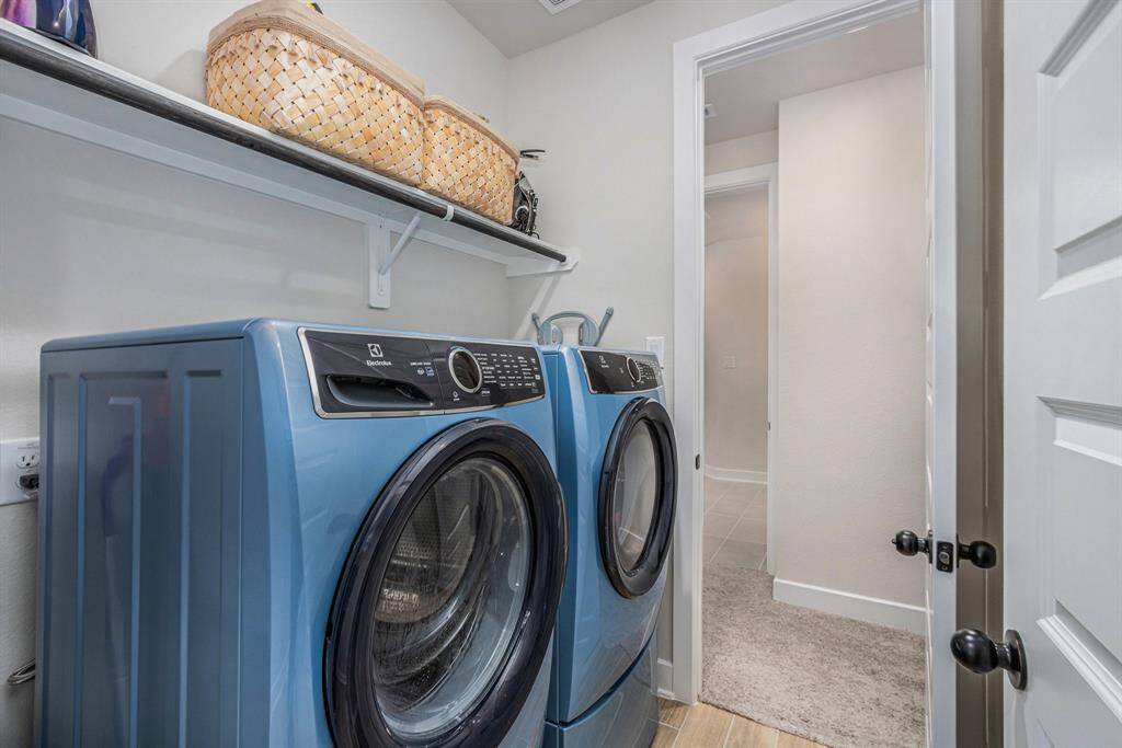 Laundry room on the first floor with space for a full-sized washer and dryer.