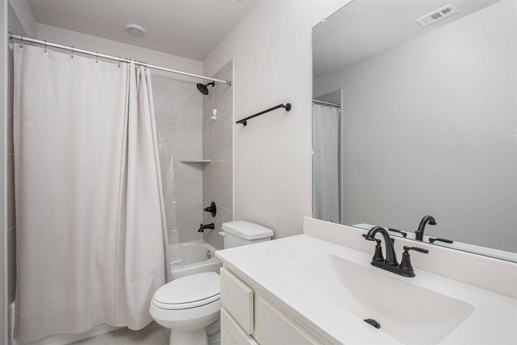 Upstairs full bathroom with tub/shower combo