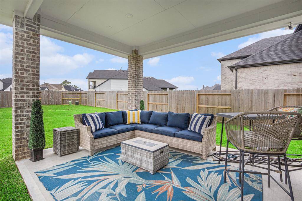 Large covered patio, great for entertaining No rear neighbors.