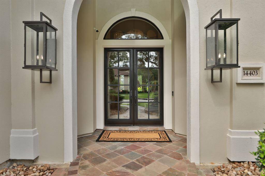 The double steel front doors are solid yet elegant.  This entrance makes an impression!