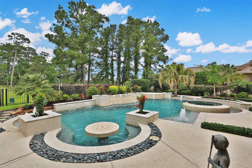 Notice the swim up table for snacks and drinks. There are several seating areas around the edge of the pool.