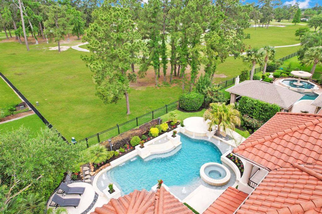 The home is located behind the 12th green of the prestigious Golf Club of Houston.