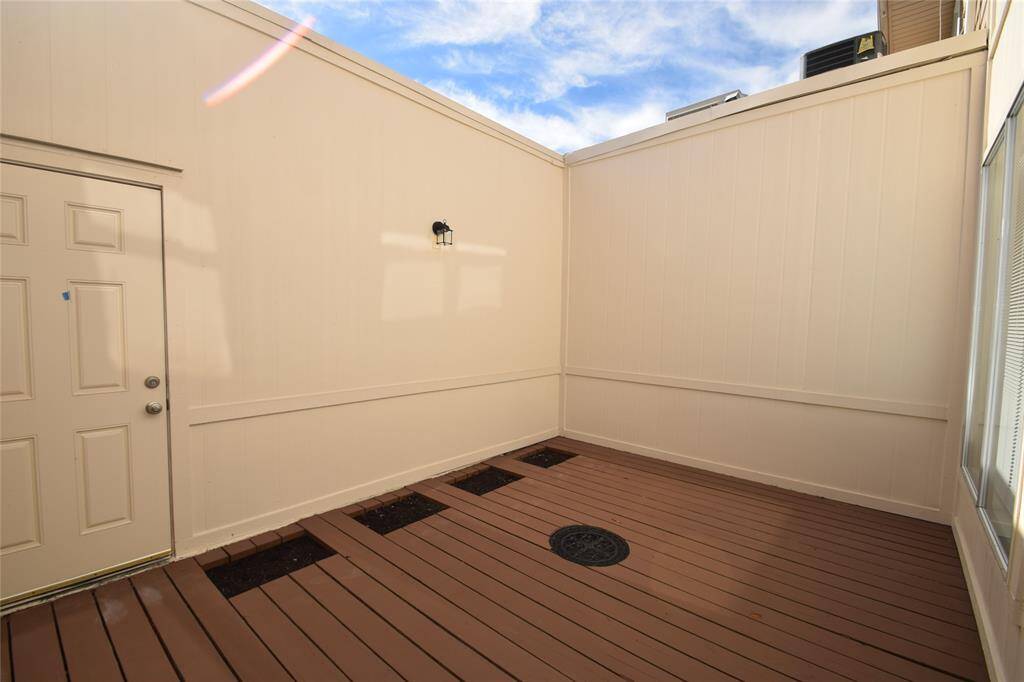 Atrium style patio area with access to the two car garage.