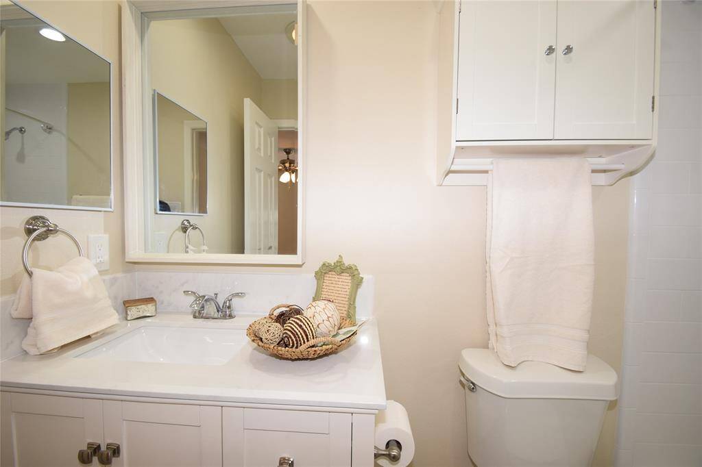 Master bath offering tile floors and a tub/shower.