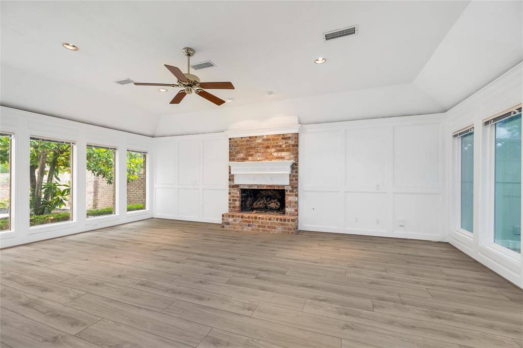 Whether you're relaxing by the wood-burning fire or hosting guests, this room offers the perfect setting for both comfort and style.