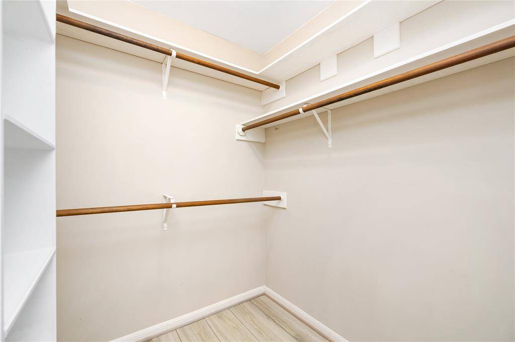 The large closet offers ample space for storage, providing plenty of room to organize your wardrobe and accessories with ease.