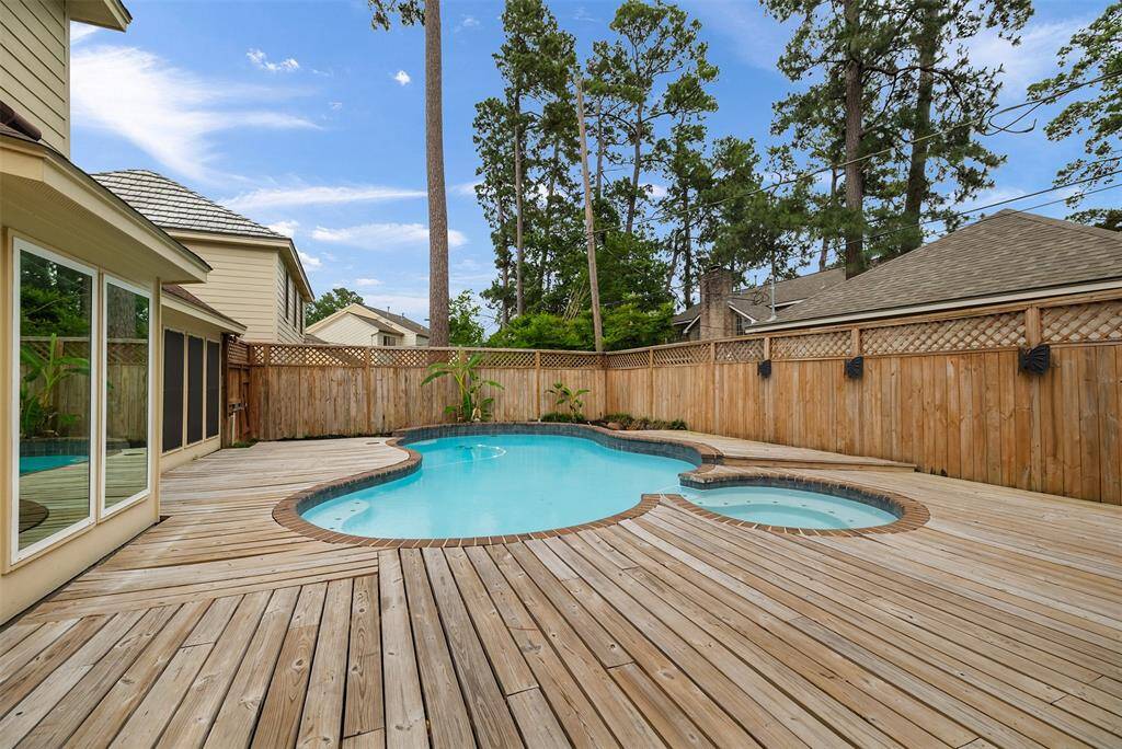 This beautiful pool features sparkling blue water, complemented by a large deck that offers plenty of space for lounging and enjoying the outdoors. It’s the perfect spot to relax and unwind in style.