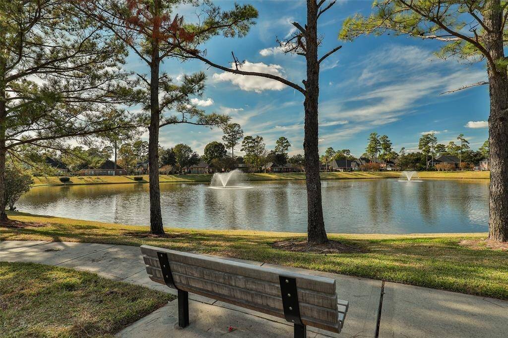 Just a short stroll from the home, you'll find a serene pond surrounded by picturesque walking trails, offering a peaceful escape for outdoor enthusiasts.