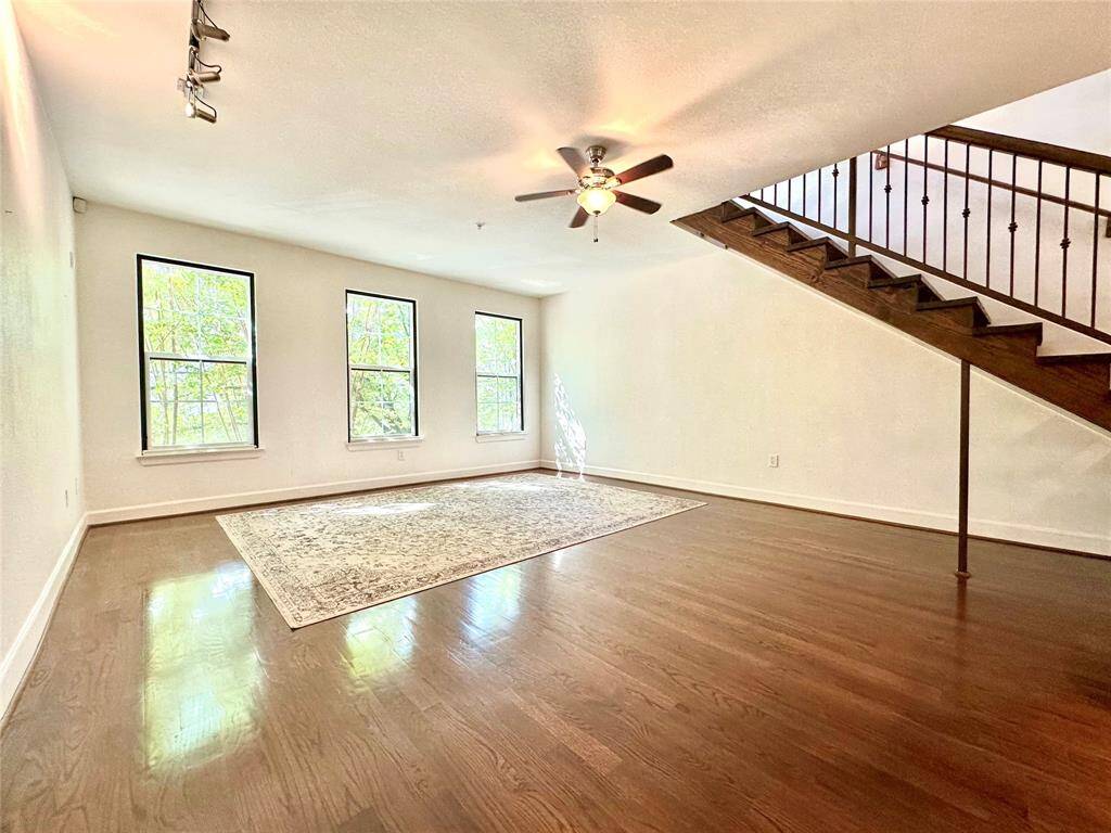 Spacious living area with windows overlooking onto Crawford Street.