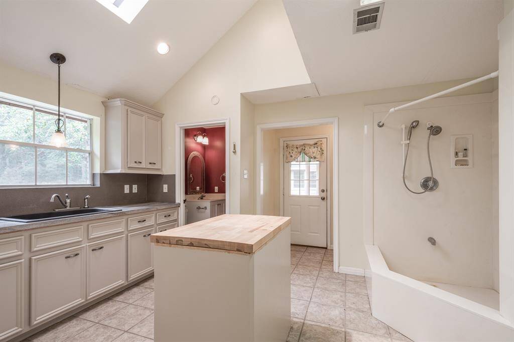 Full bath and utility area
