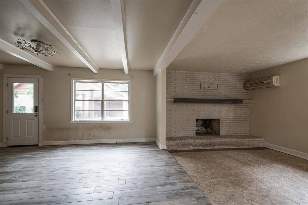 Open dining area and living room in home.