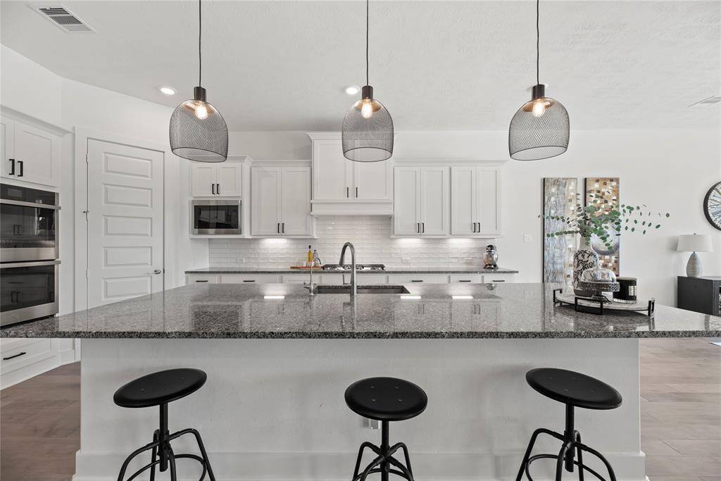 Alternate view of kitchen.