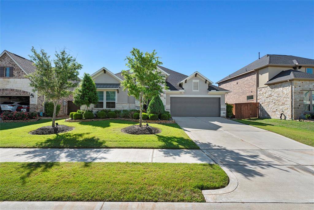 The stone and stucco home is designed with your comfort in mind.