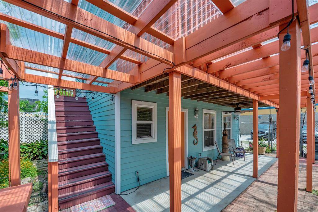 Garage entrance and stairs to apartment