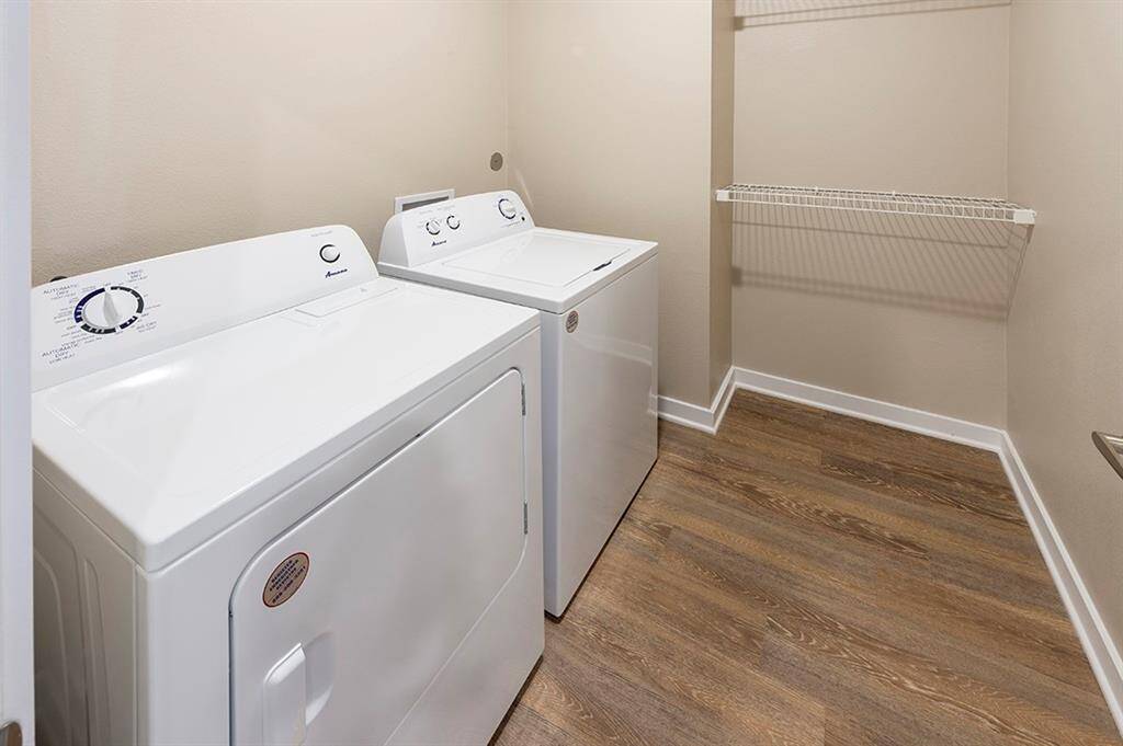 Utility room with full size washer and dryer