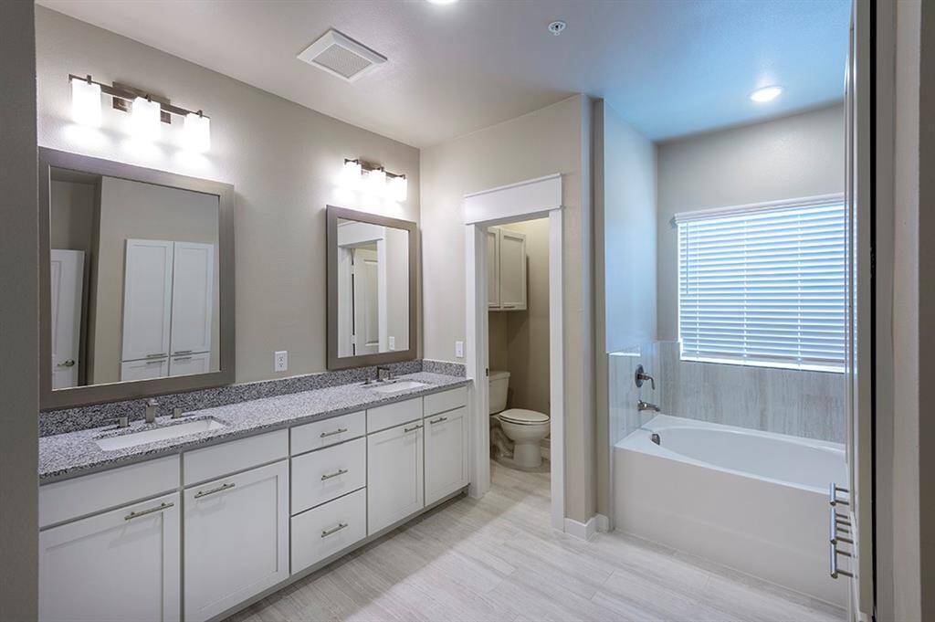Primary bath with double sinks and oversized soaking tub
