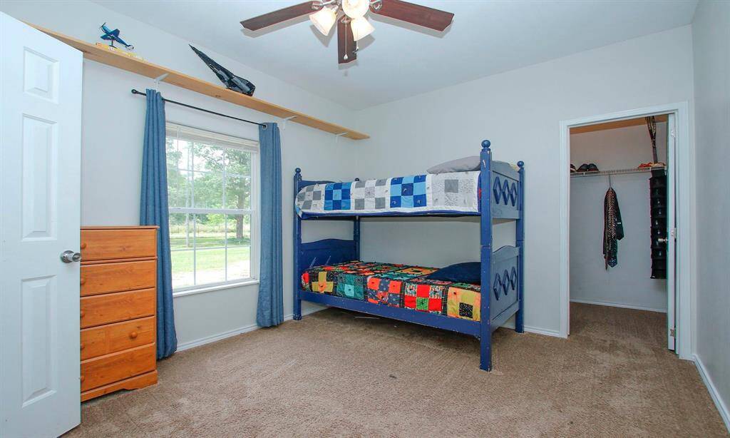 Bedroom 2 located near the front of the family room.