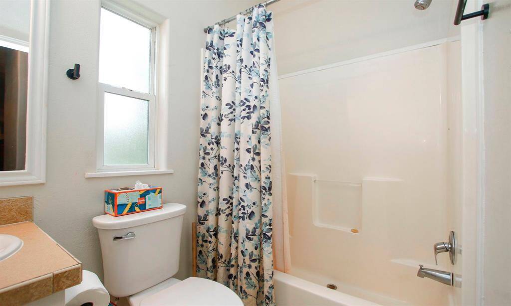 Bathroom #4 is near the back of the home and accessible to the family room and flex room/7th bedroom