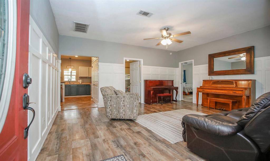 You enter the home to a formal living space