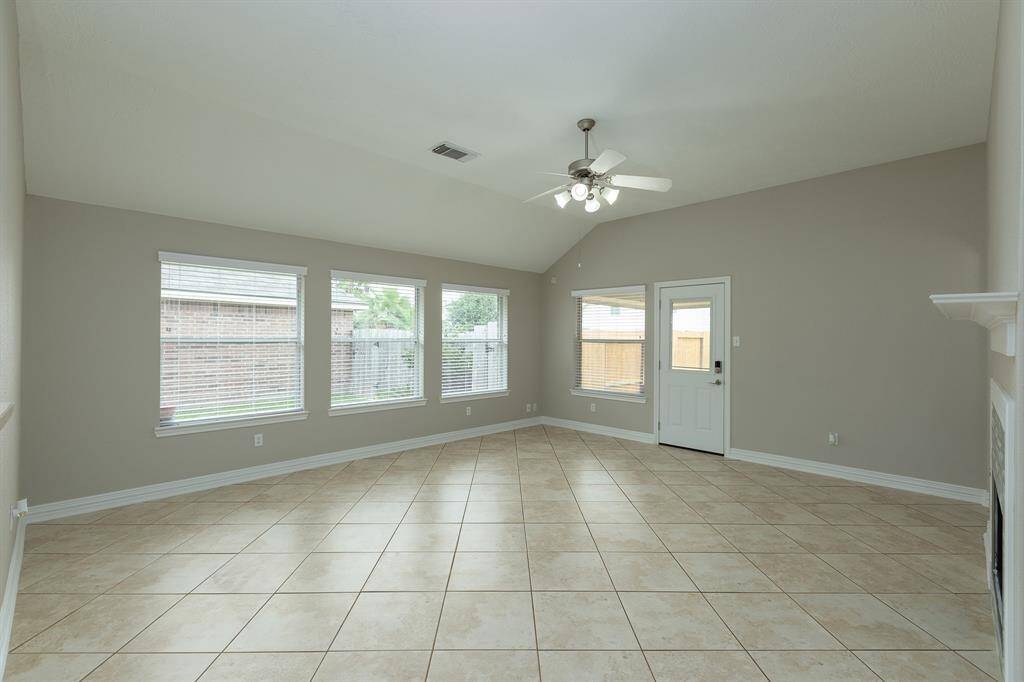 Spacious family room filled with natural light
