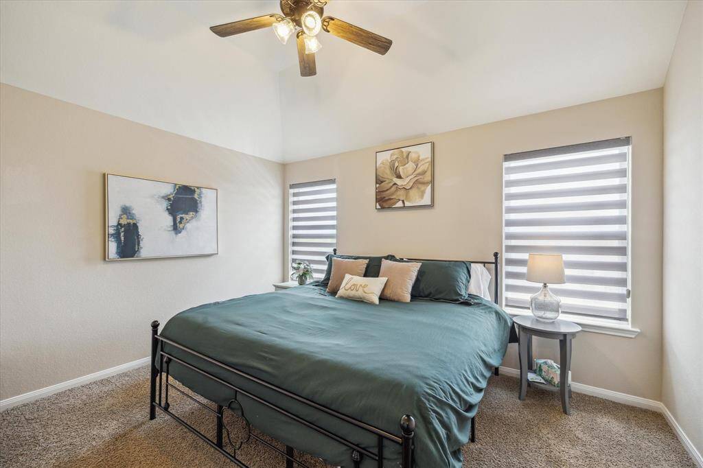 Secondary bedroom located on the second floor, offering privacy and ample space.