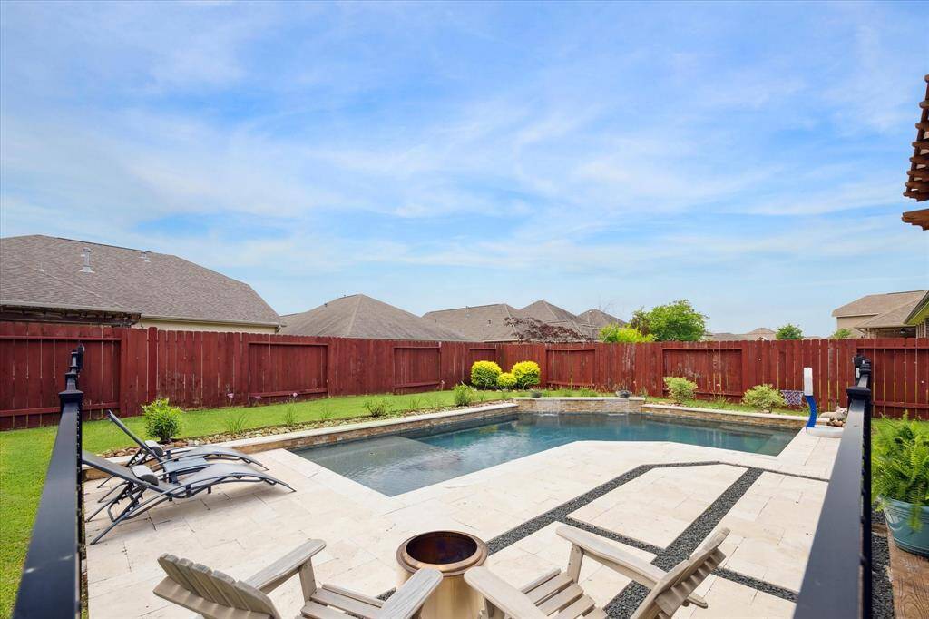 Stunning backyard pool, ideal for relaxing or entertaining in a private, resort-like setting.