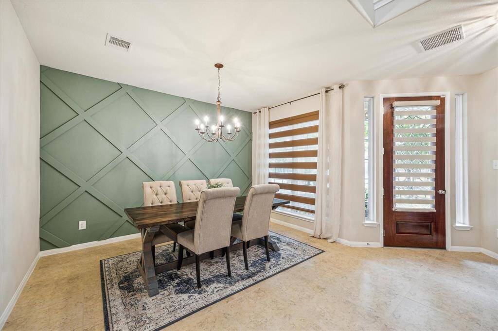 Elegant formal dining room located just off the foyer, perfect for hosting gatherings.