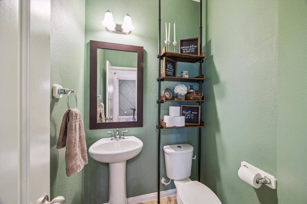 Convenient powder room located on the first floor, perfect for guests.
