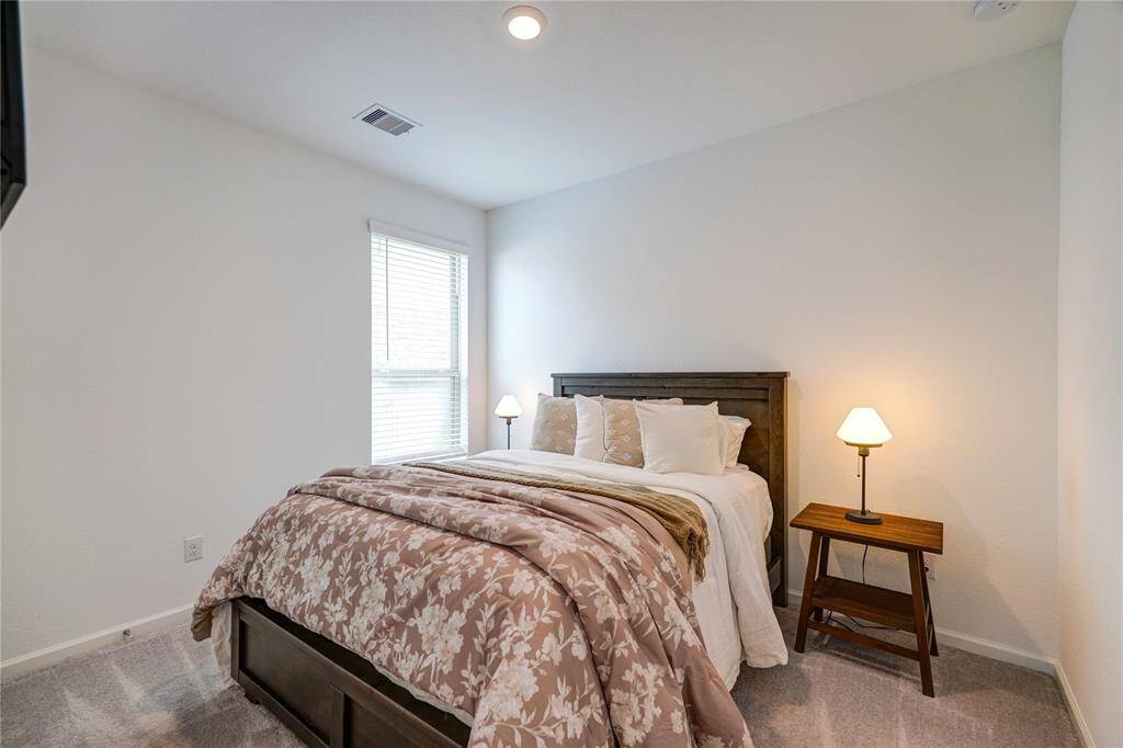 Nice size secondary bedroom. Can fit a full or queen size bed if desired.