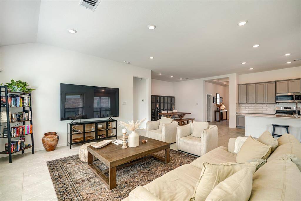 Relax in your beautiful living room. There is plenty of entertainment space in your new home!