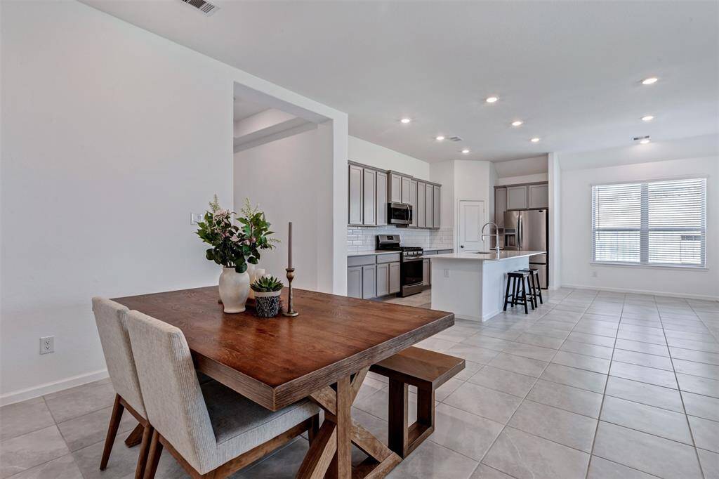 Another view of the kitchen/breakfast area from the formal dining room. Very open!