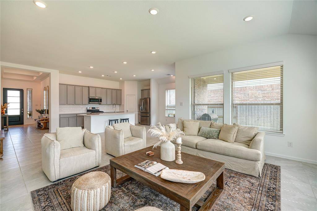 Open and airy, light and bright! That's what you can expect in this open floorplan. There is plenty of natural light and recessed lighting throughout.