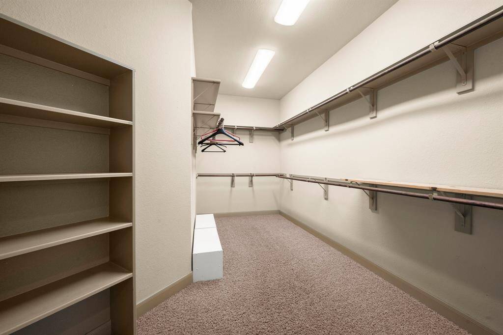 Walk in closet in primary bathroom