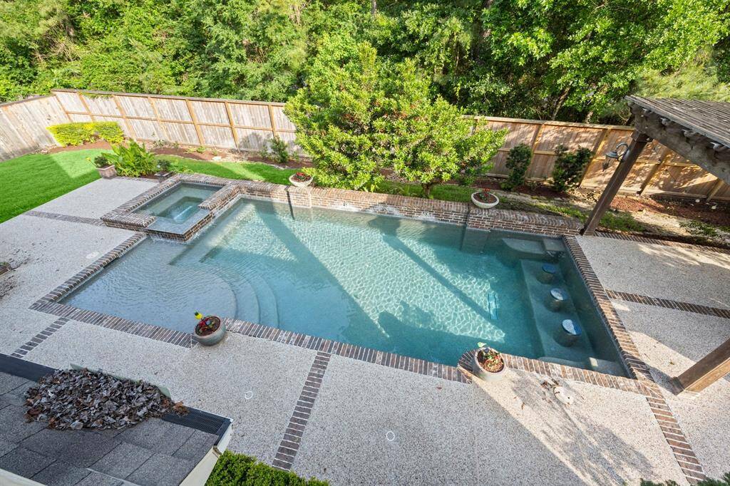 View of pool for second story balcony