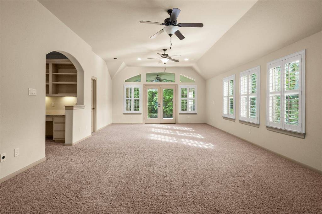 View of gameroom showing balcony overlooking the pool